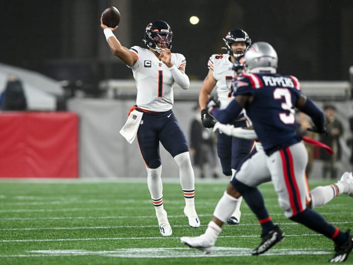 Oct 24, 2022; Foxborough, Massachusetts, USA; Chicago Bears quarterback Justin Fields (1) passes the ball against the New England Patriots during the first half at Gillette Stadium.